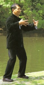 Qigong holding the balloon exercise position